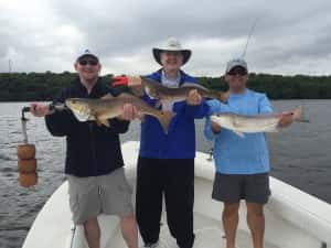 Family Catching Fish in Tampa Florida