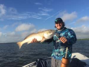 Slamming The heck out of monster red fish 13-15 lbs